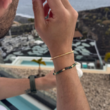 Slim gold men's bracelet with green beaded bracelet