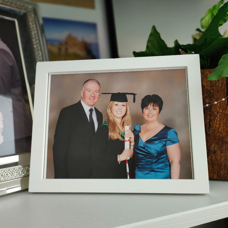 Ivy and Gold Zoe Wilson with her mum and dad on graduation