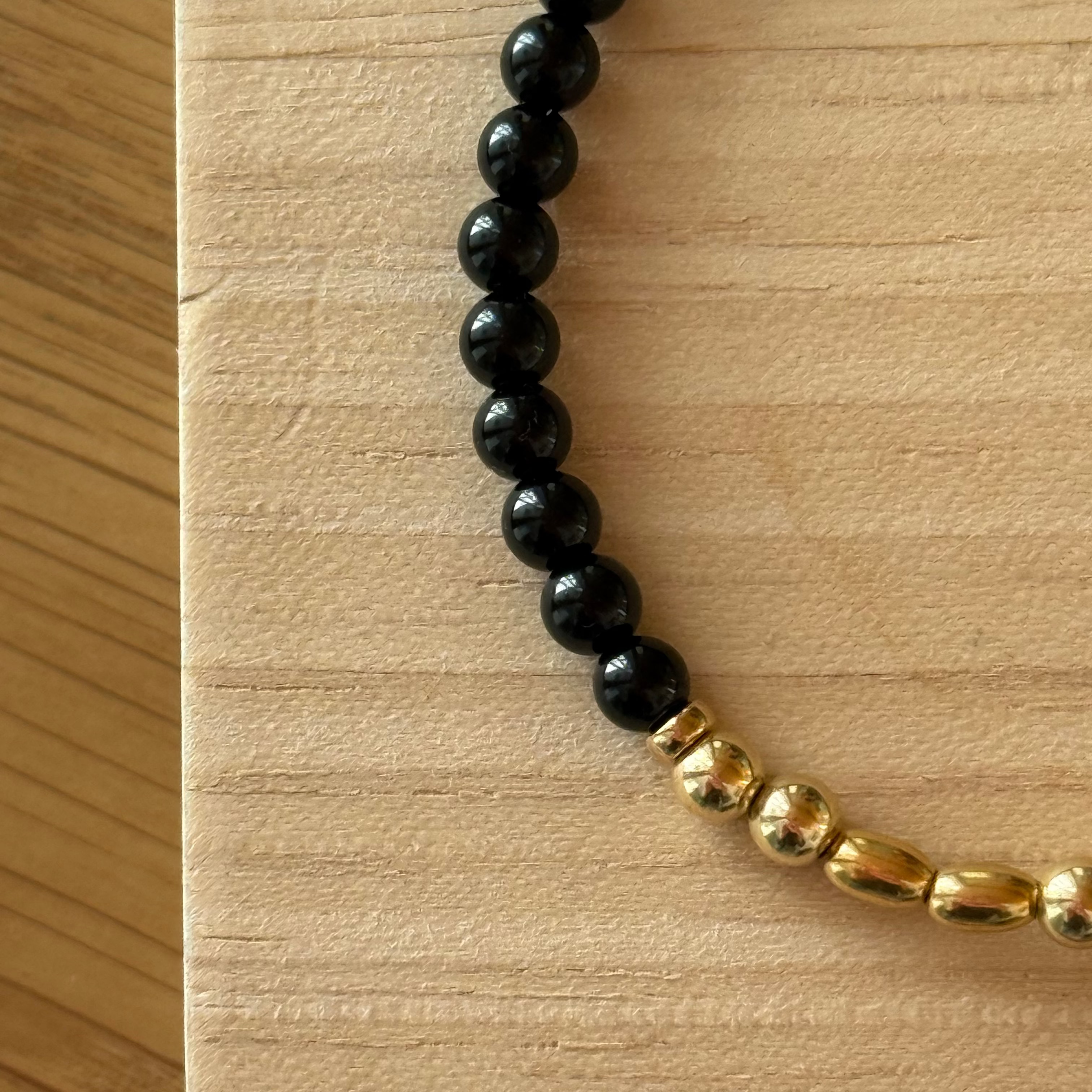 Black agate men's bracelet close up
