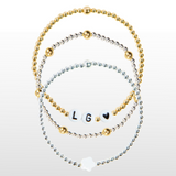 Summer stack bracelets with pearl flower and personalised