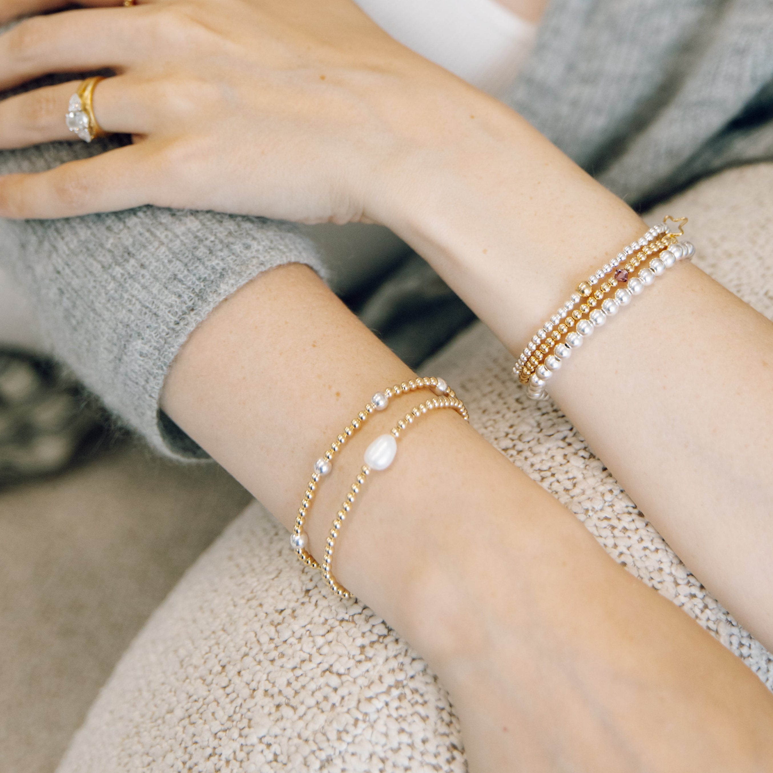 mixed metal stack of bracelets